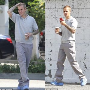 Justin Bieber ditches his trademark baggy attire for smart polo shirt and slacks as he checks out commercial real estate in LA