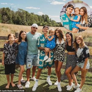 ‘Ma familia!’ Justin Bieber and wife Hailey pose with his siblings on a farm in Canada