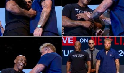 Mike Tyson PUNCHES Jake Paul in stomach in First Face OFF at press conference!